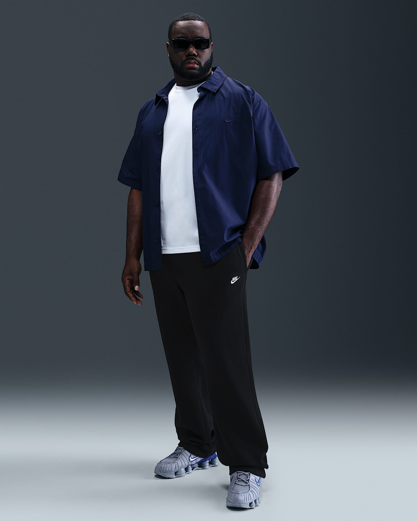 Club Pantaloni in fleece con orlo aperto FN3730 010 NIKE