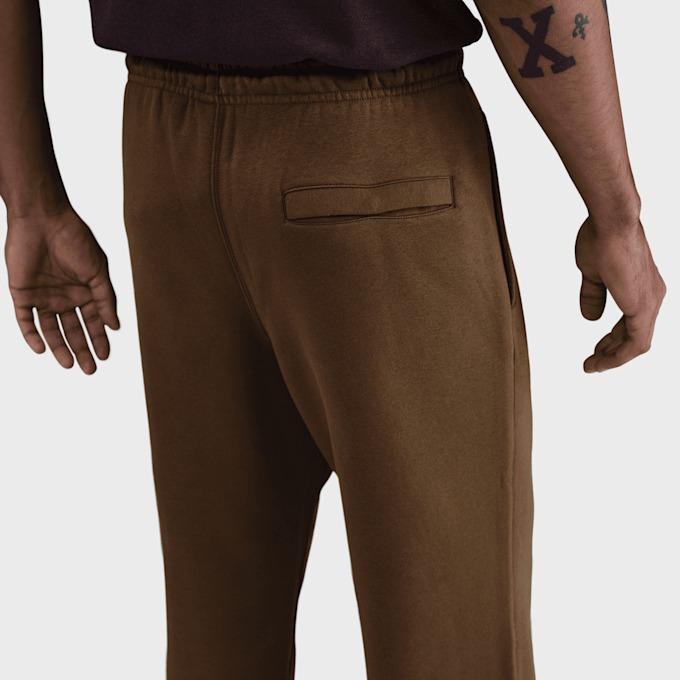Club Pantaloni in fleece con orlo aperto FN3730 235 NIKE