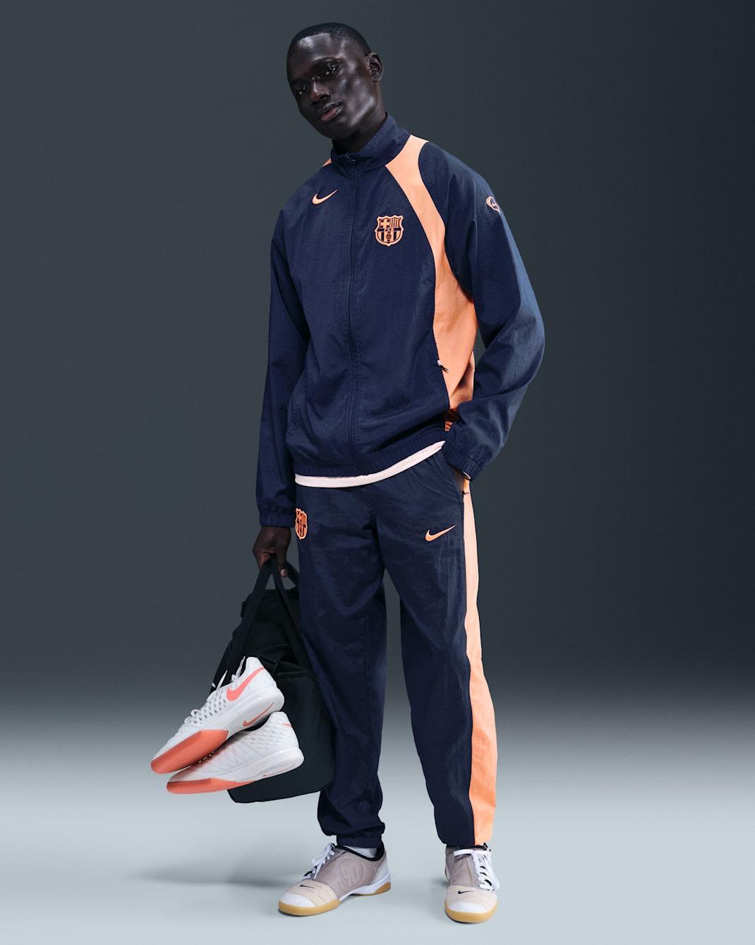 FC Barcellona Men's Nike Soccer Total 90 Soccer Tracksuit HQ9735 410 NIKE