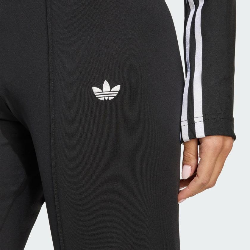 Pantaloni svasati con dettagli a nastro e 3 strisce sfalsate. JX2697 UNI ADIDAS