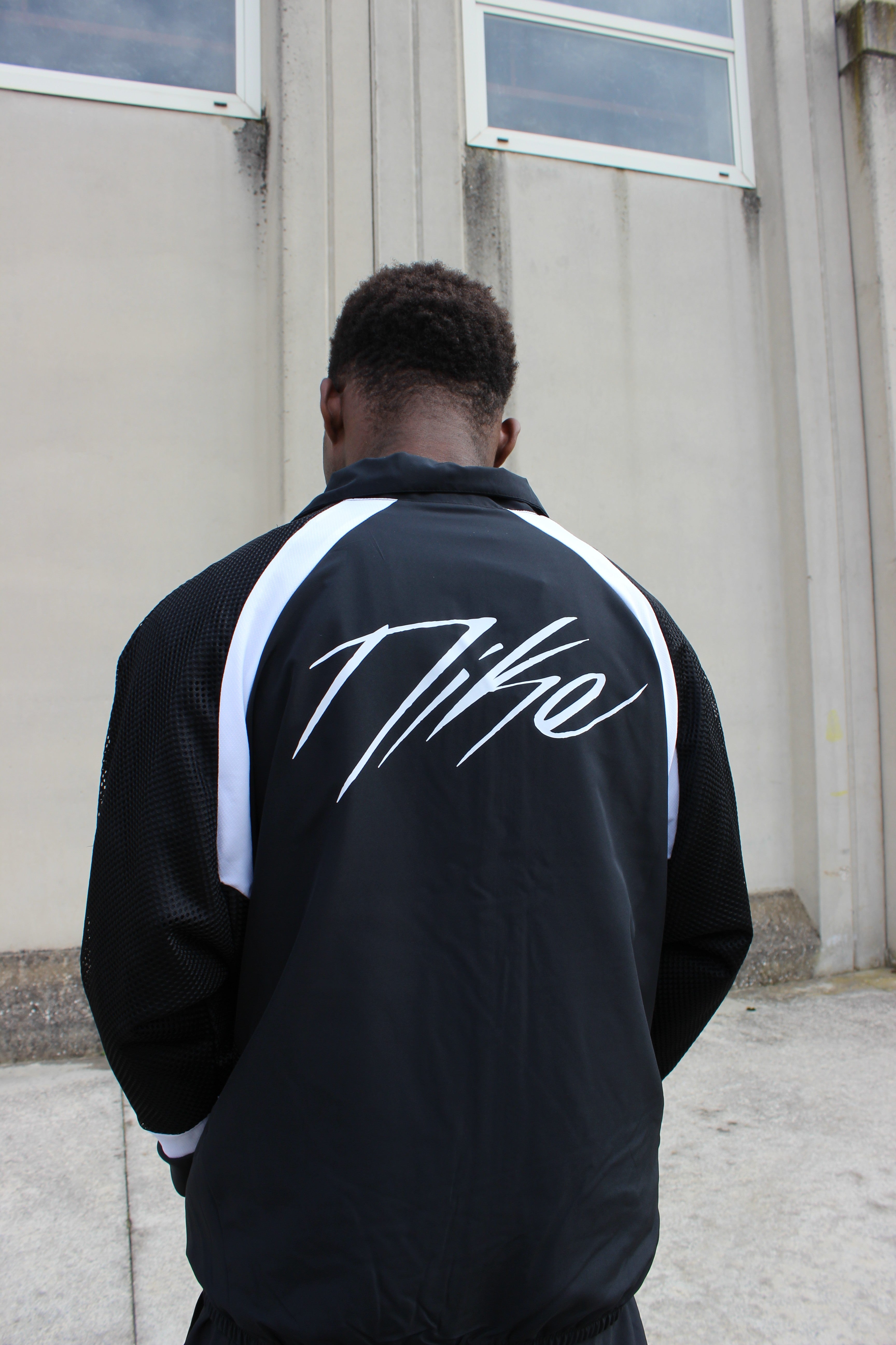 Tracksuit Icon HV3363 010 NIKE 