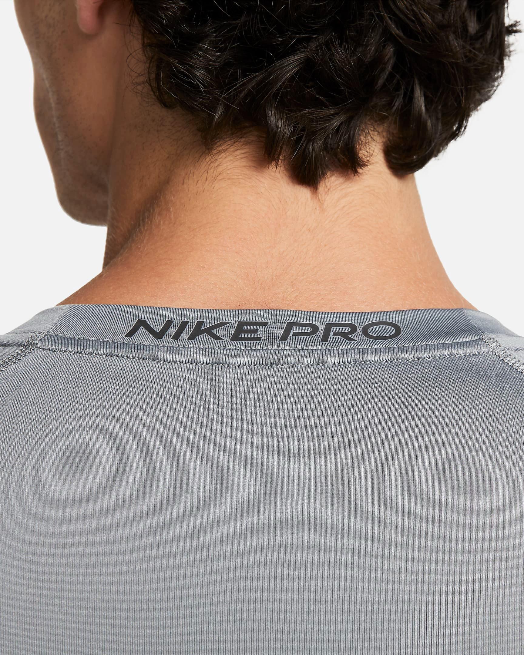 Maglia da fitness aderente a manica lunga FB7919 084 NIKE 
